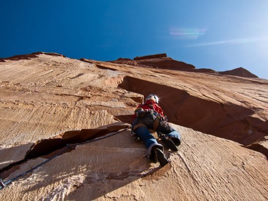 Sandrine pratique l'escalade à très haut niveau ©odysea